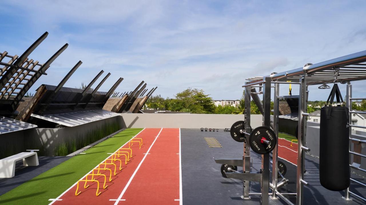Lux* Grand Baie Resort & Residences Esterno foto The track at the National Training Centre