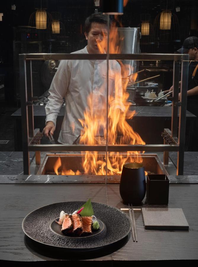 Lux* Grand Baie Resort & Residences Esterno foto A flaming grill